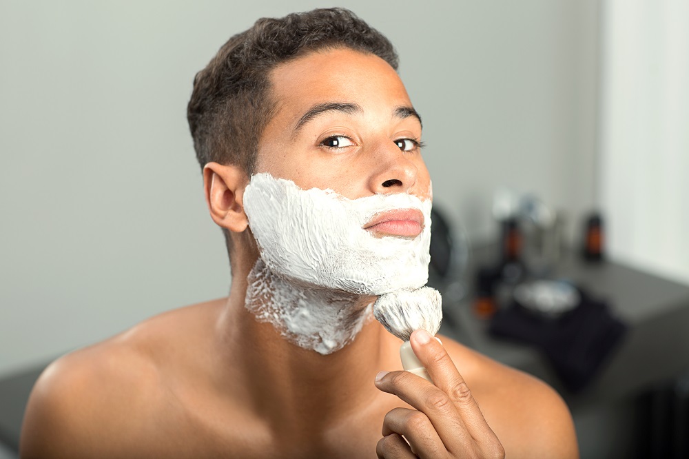 Mens skincare-lifestyle-model-applying-shaving-foam-in-bathroomresized