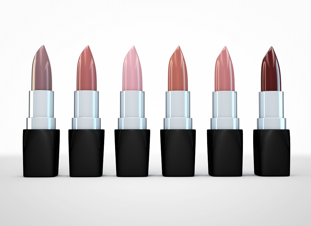 Set of lipsticks nude colors. Beige lipstick in a row isolated on white. 3d illustration of lipstick natural color.