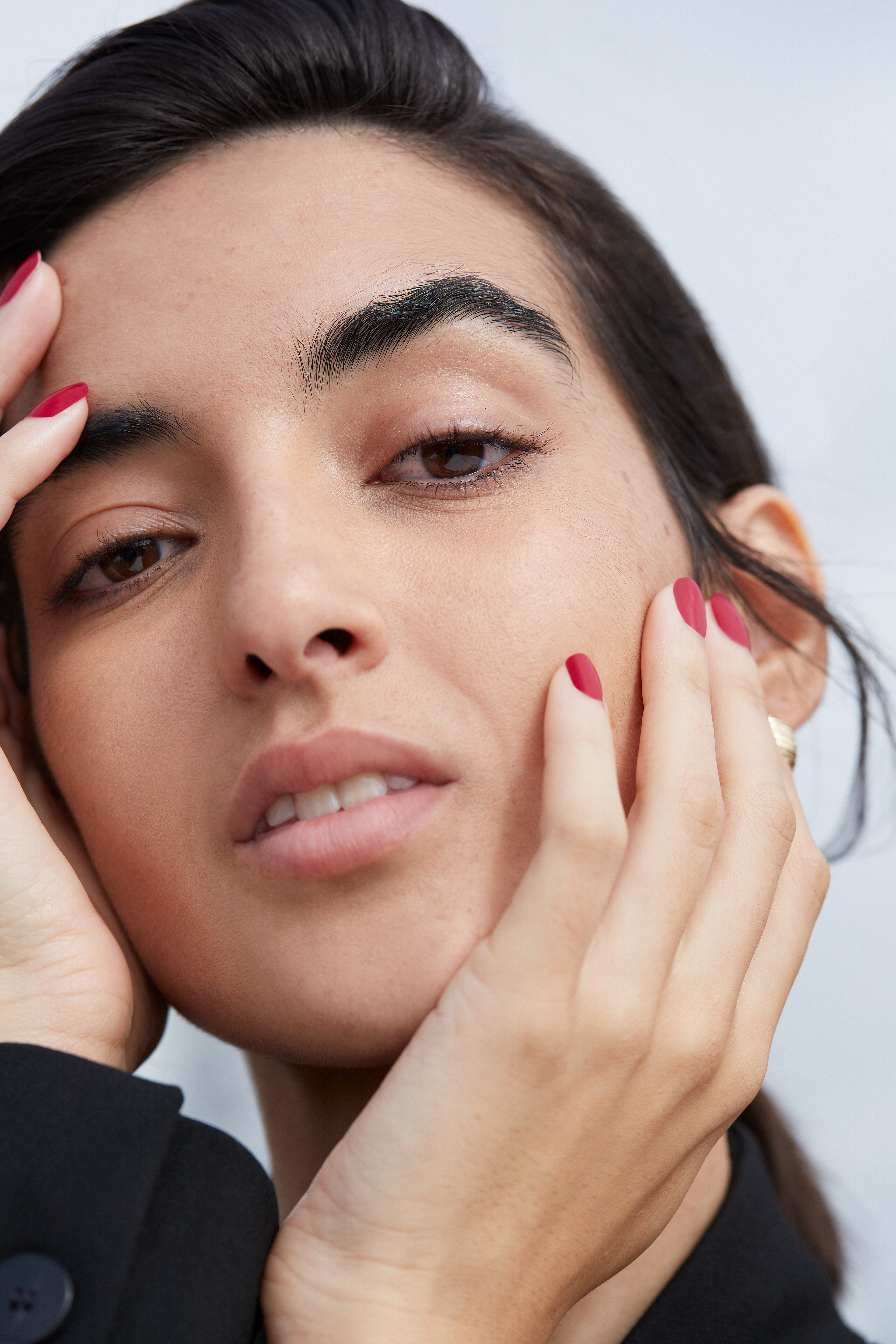 Shot 2_189 Female model with hands cupping face