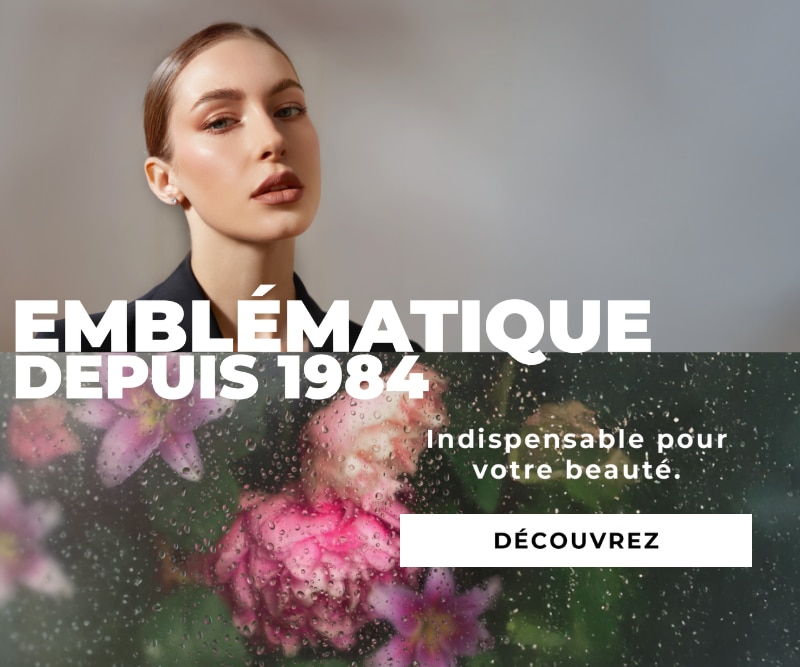 Visuel de campagne Marionnaud 1984 avec fleurs derrière une vitre mouillée, accompagné du texte ‘Emblématique depuis 1984’ et ‘Indispensable pour votre beauté’, avec bouton ‘Découvrez’.