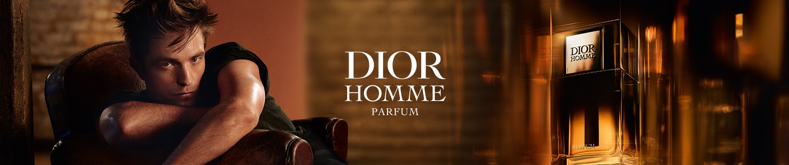 Parfum Dior Homme dans un flacon ambré élégant, présenté sur un fond chaleureux.