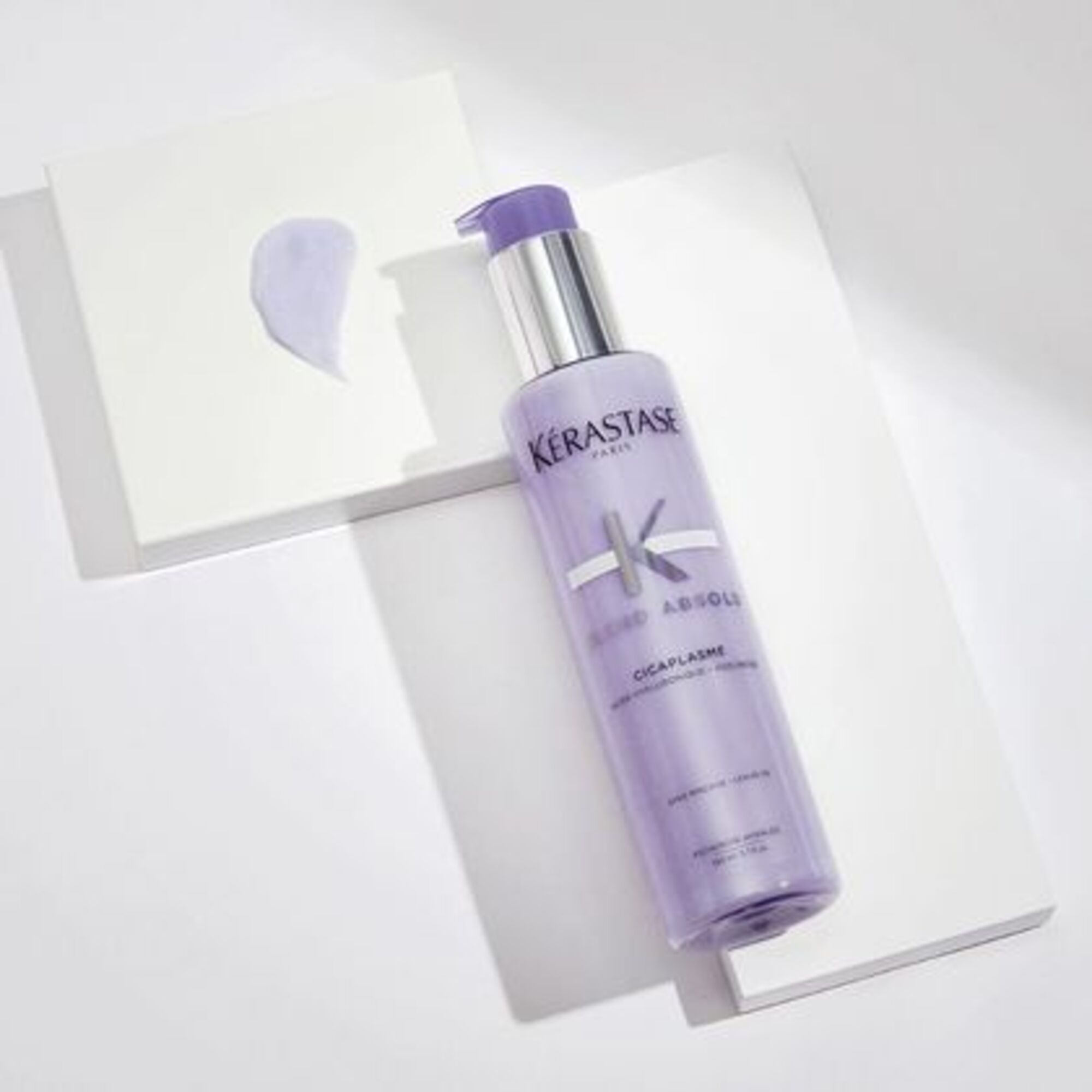 Reparierendes Serum mit Hitzeschutz für aufgehelltes oder gesträhntes Haar